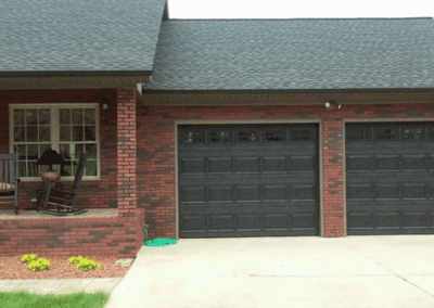 black traditional single car two door garage panel