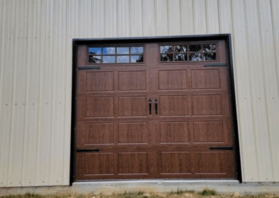 single car long recessed panel garage