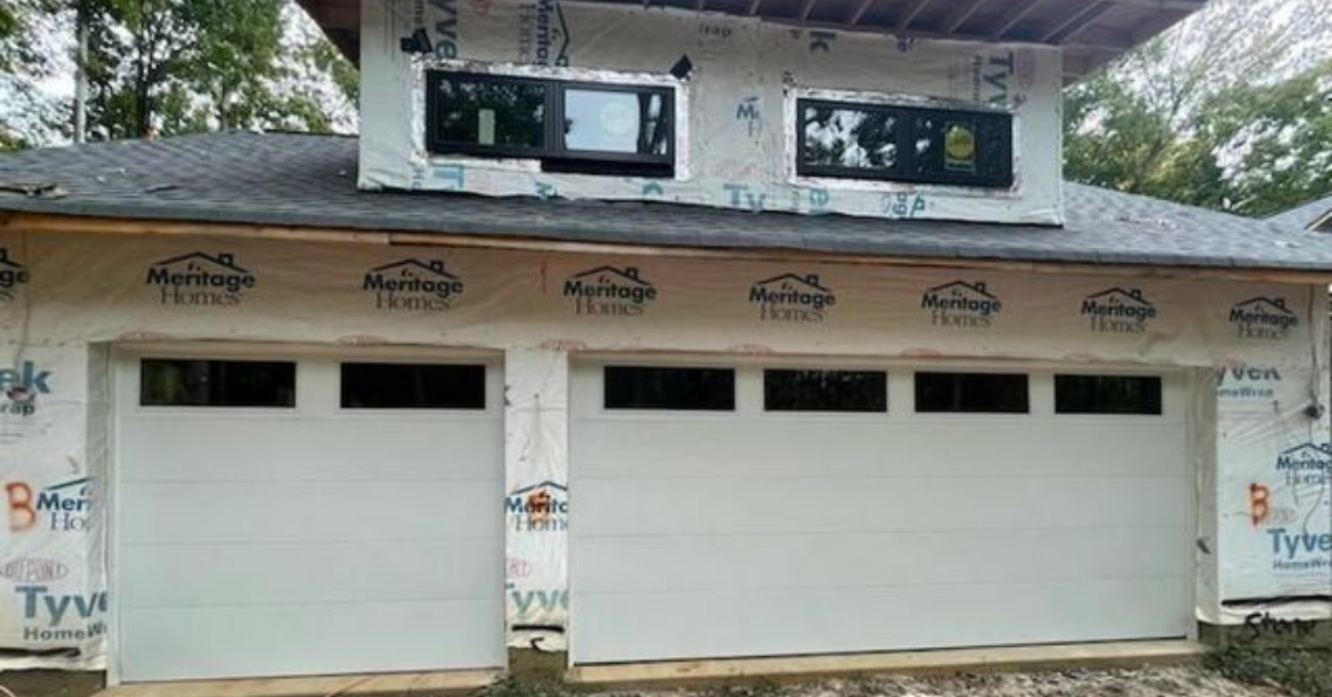 three car single attached grooved panel garage