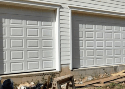 traditional raised panel three car garage